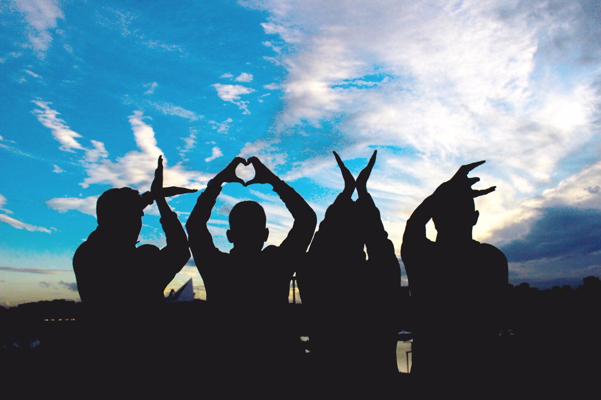 a group of people with hands illustrating LOVE