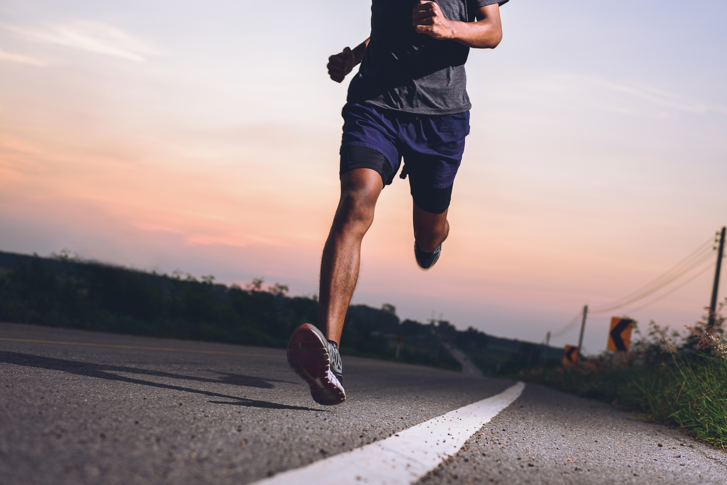 man running at sunset on a track set the pace blog post on covenant fellowship church okc